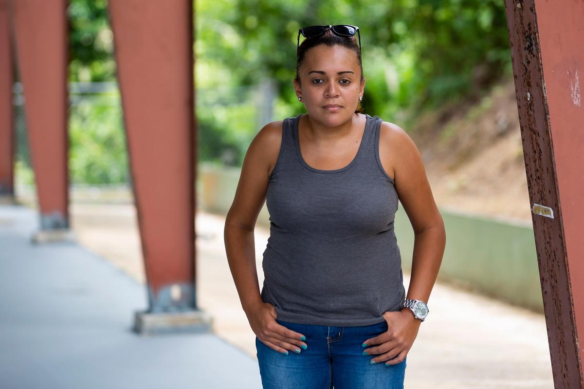 Liz Nazario, 30, in the Las Mulas neighborhood in Naranjito, Puerto Rico, on Aug. 21, 2018. Nazario, who spent months without electricity after Maria, is still battling anxiety, fatigue and stress from the storm.