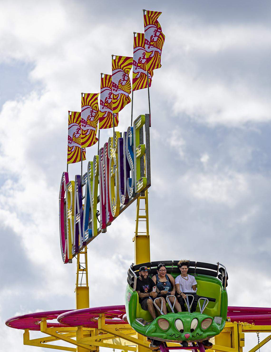 Guests ride the Crazy Mouse attraction during the opening day of the 74th annual Miami-Dade County Youth Fair on Thursday, March 12, 2026, in Miami, Fla.