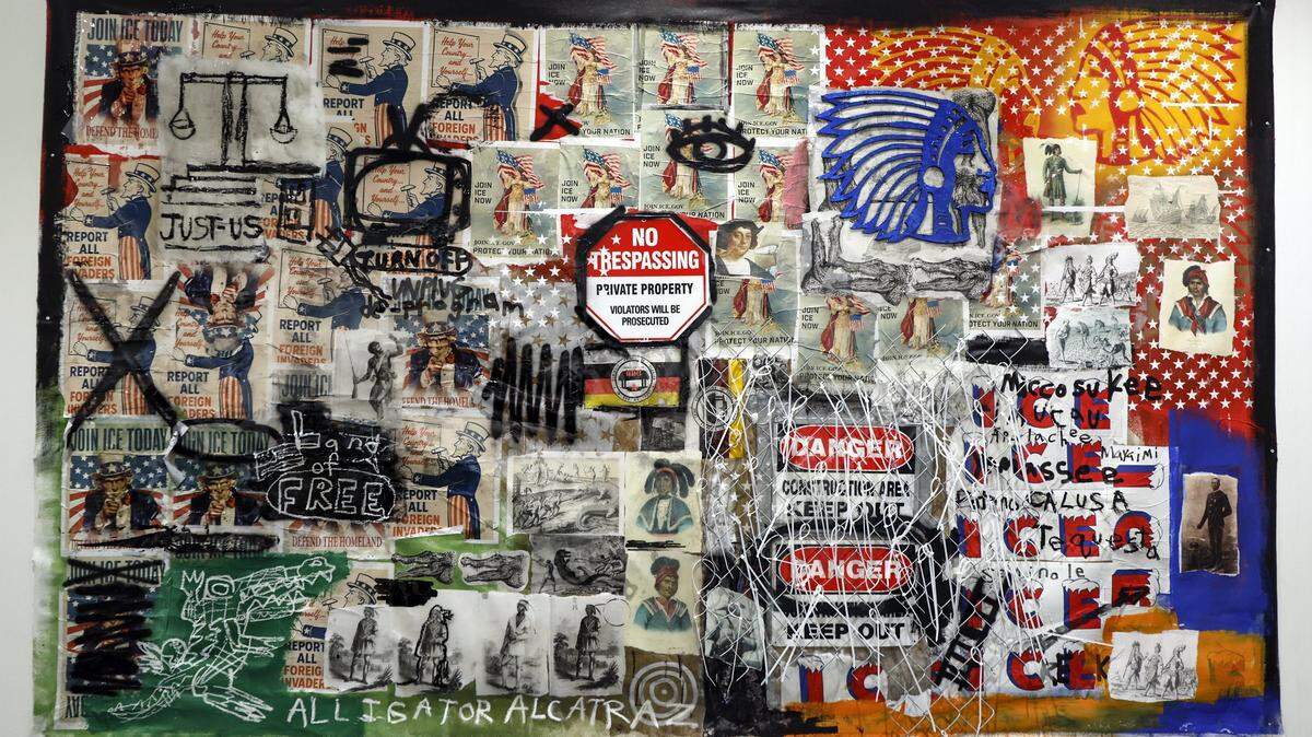 Clarence James’ “Cruelty is The Point” debuted this week at SCOPE Art Show as part of an Amnesty International exhibit protesting the Alligator Alcatraz immigration detention center in the Florida Everglades. 