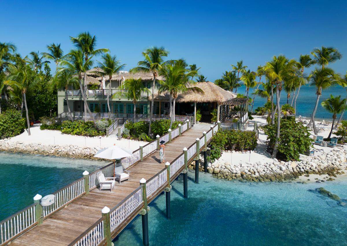 Enjoy privacy and serenity on the blue waters of Little Palm Island.