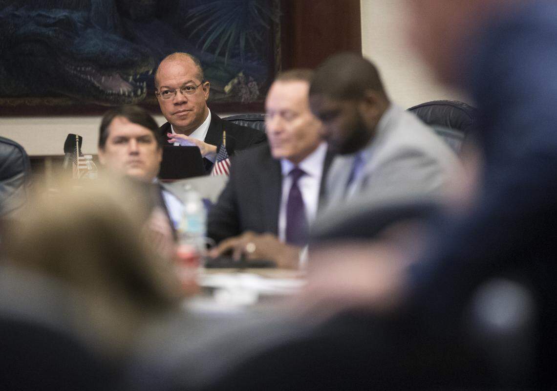 Rep. Mike Hill listens during legislative session at the Florida State Capitol on April 3, 2019, in Tallahassee.