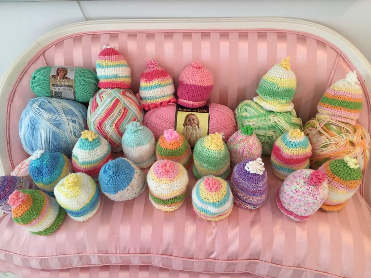 Some of the hats Mazie Ford crocheted for the newborns at Memorial Healthcare.