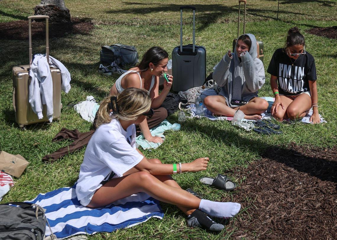 A group of New Jersey college visitors take in some sun before departing back home while sharing their memories of spring break in Miami Beach on Thursday, March 13, 2025.