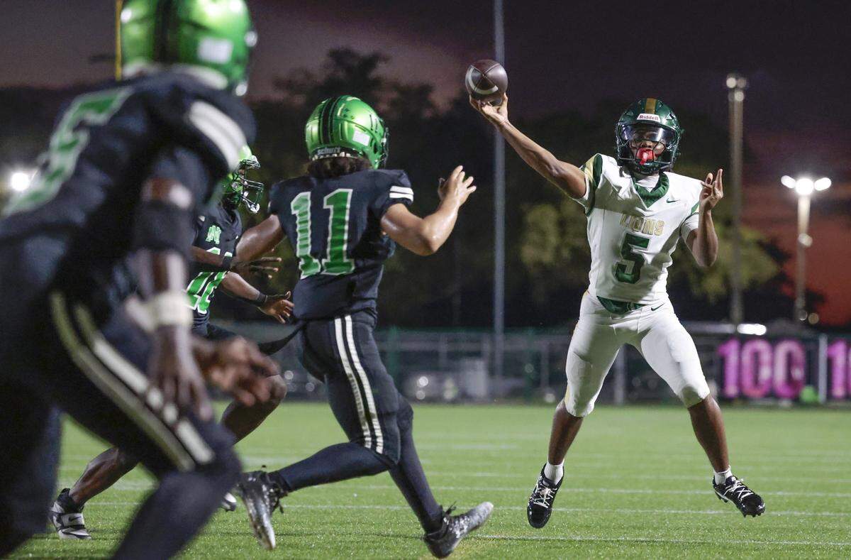 Mater Academy quarterback Dontavious Kinchens (5) sets up to pass against North Miami High School during their high school football game at Milander Stadium in Hialeah, Florida, on Saturday, September 27, 2025.