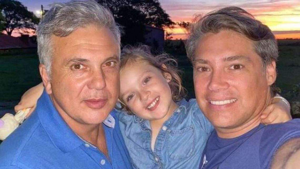 Argentines Fabian Nunez, left, Andres Galfrascoli and their daughter Sofía.