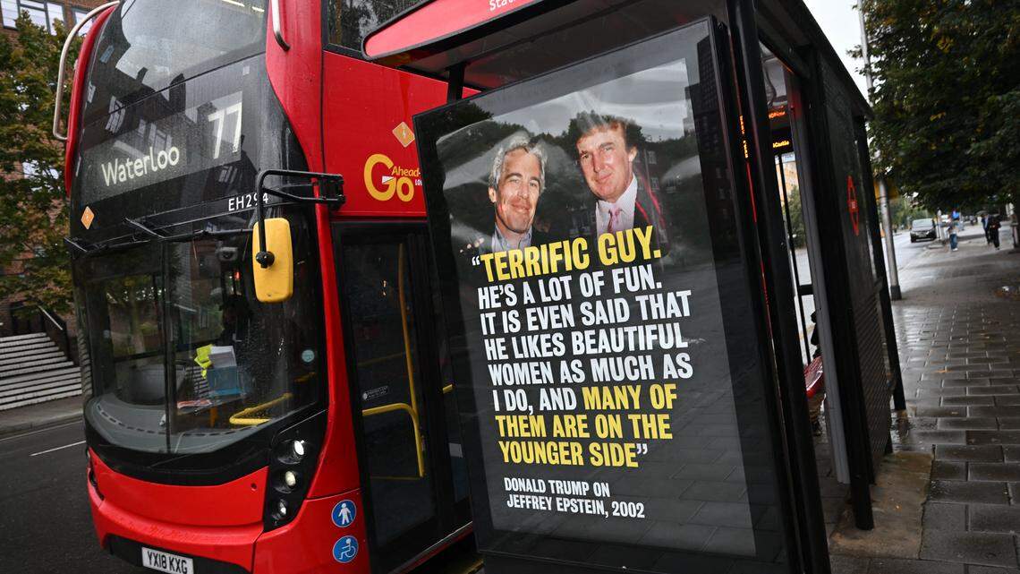 A poster with a 2002 quote by US President Donald Trump about convicted sex offender Jeffrey Epstein displayed on the side of a bus shelter in London on September 3, 2025.