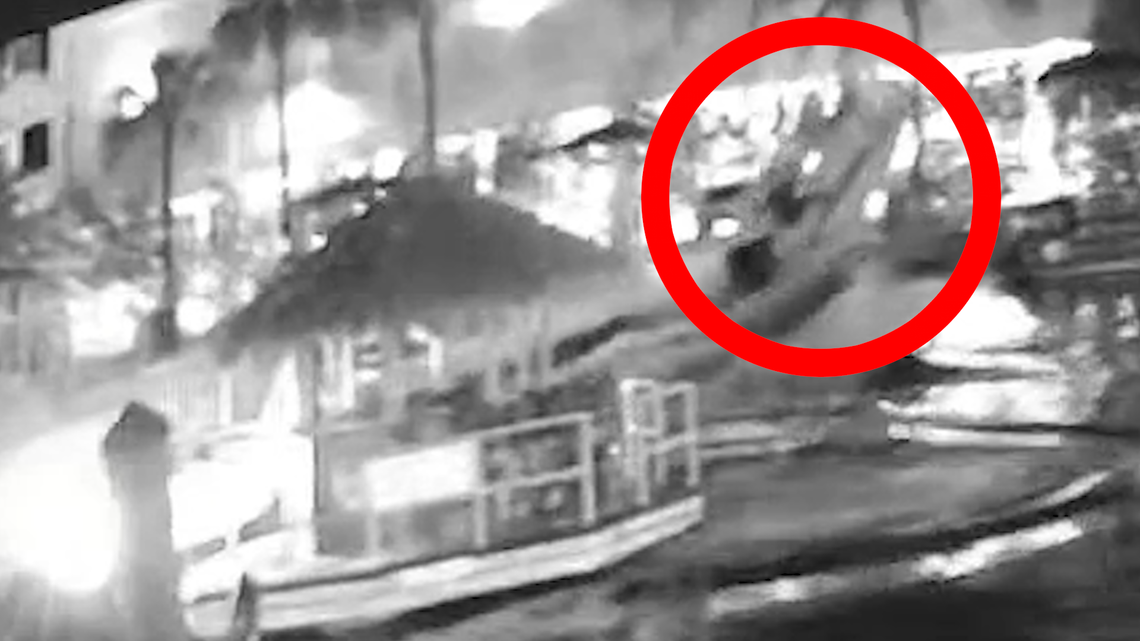 A still shot from a Ring doorbell camera shows a boat airborne as it crashed into a Key Largo dock Saturday night, Nov. 2, 2024.