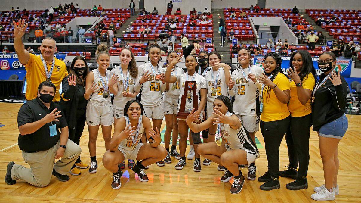 American Heritage show four fingers after defeating Palm Bay and winning the FHSAA Girls Basketball 5A Finals four straight years in Lakeland, Florida, Saturday, February 27, 2021.
