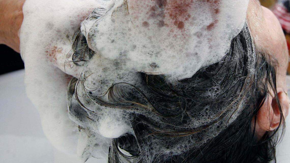 From fish oil soap to chickpea flour, here’s what TikTok creators are using to wash their hair. (AP Photo/Jens Meyer)