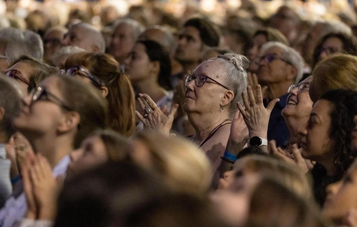 A crowd claps while Dr. Jane Goodall gives a lecture during ‘An Evening With Jane Goodall: Inspiring Hope Through Action’ at Florida International University’s Ocean Bank Convocation Center on Friday, March 31, 2023, in Miami, Fla.