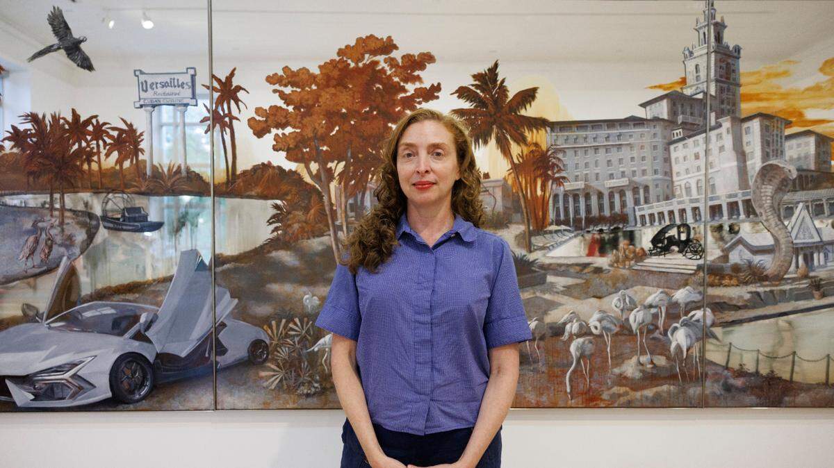 Artist Rachel Feinstein poses in front of her artwork entitled “Panorama of Miami.”