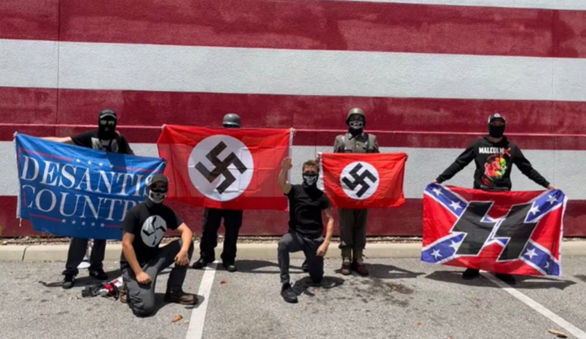 Members of the NSDAP neo-Nazi group at a May 2022 protest outside Disney World.