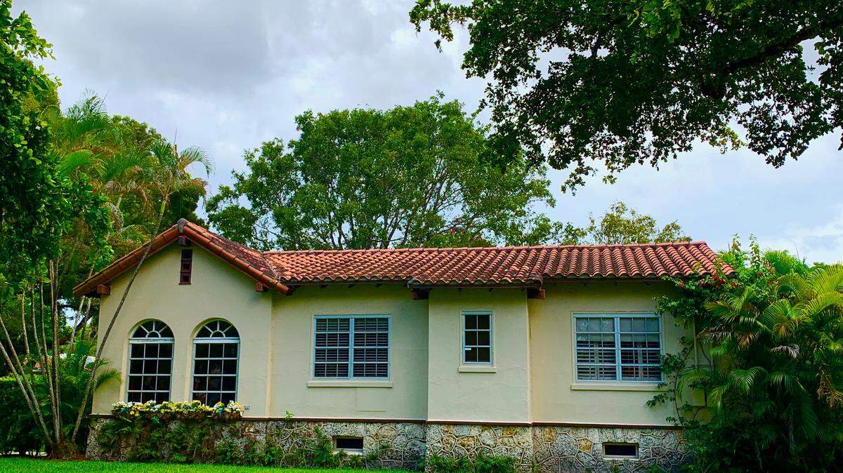 Neighbors in Coral Gables are appealing for the preservation of 603 Minorca, a nearly 100-year-old house that is constructed on a rare coral rock stem foundation integrated with the structure along with its chimney.