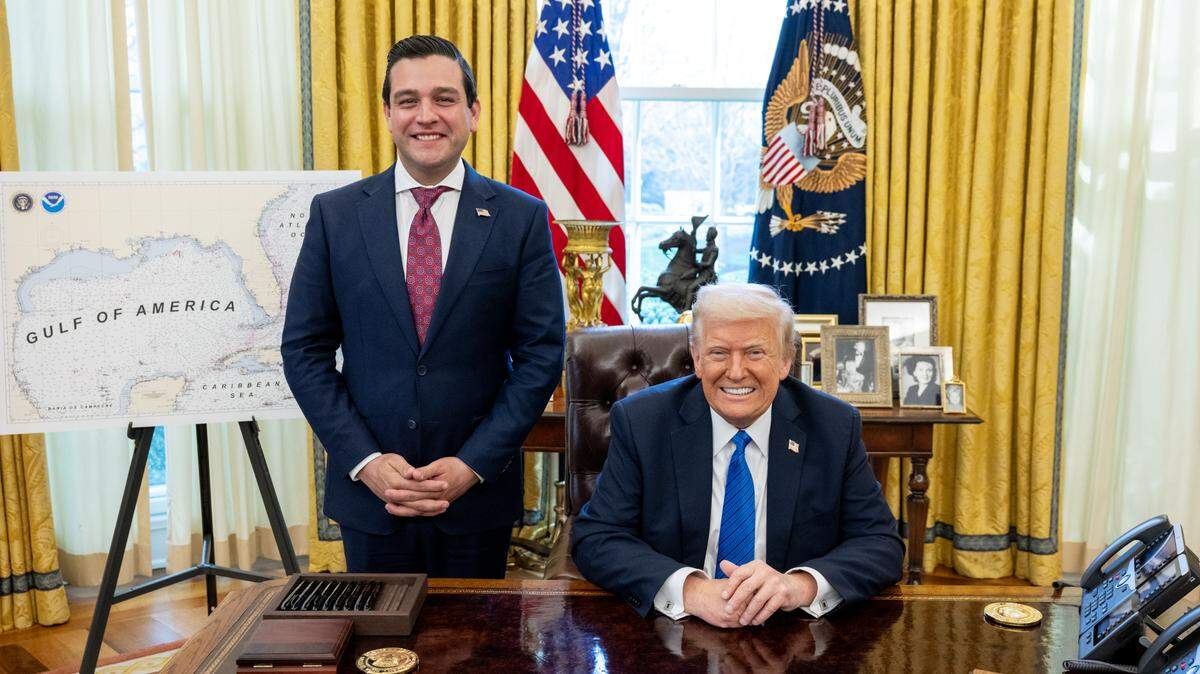 Then-Miami-Dade Commissioner Kevin Cabrera poses with a seated President Donald Trump in the Oval Office on March 25, 2025, after a Senate committee advanced Cabrera’s nomination as ambassador to Panama.