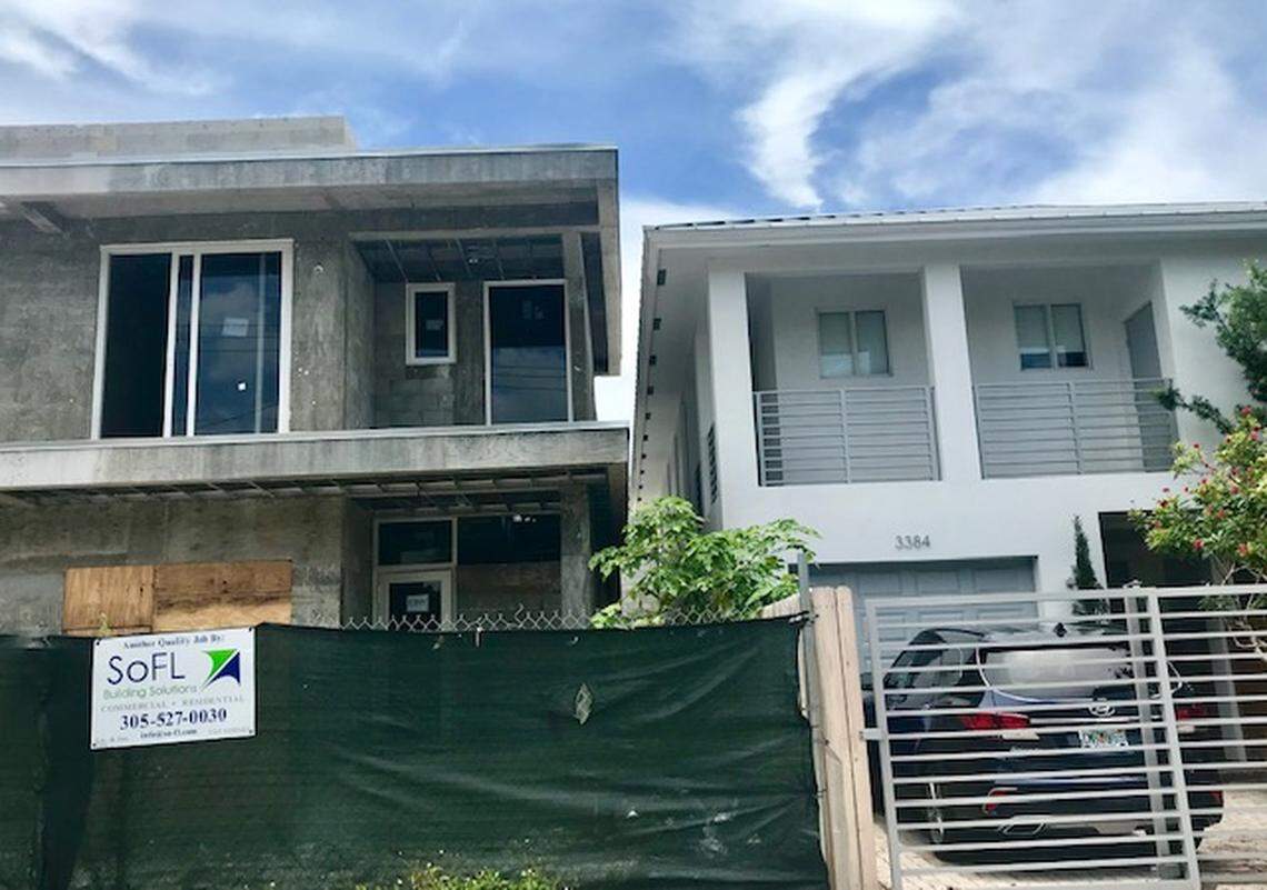Two houses on the 3300 block of Day Avenue in West Coconut Grove are so close together that only 4 feet, 6 inches of space separates them despite a Miami zoning law that requires 10 feet of space between houses. Residents are protesting the city’s decision to settle rather than fight a lawsuit by the developer and allow the houses to stand.