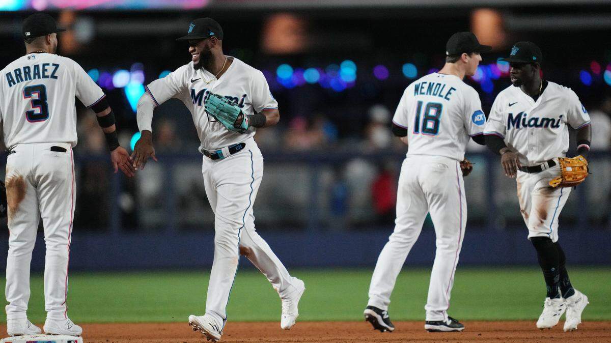 Jun 22, 2023; Miami, Florida, USA; The Miami Marlins celebrate a 6-4 victory over the Pittsburgh Pirates at loanDepot Park. Mandatory Credit: Jim Rassol-USA TODAY Sports