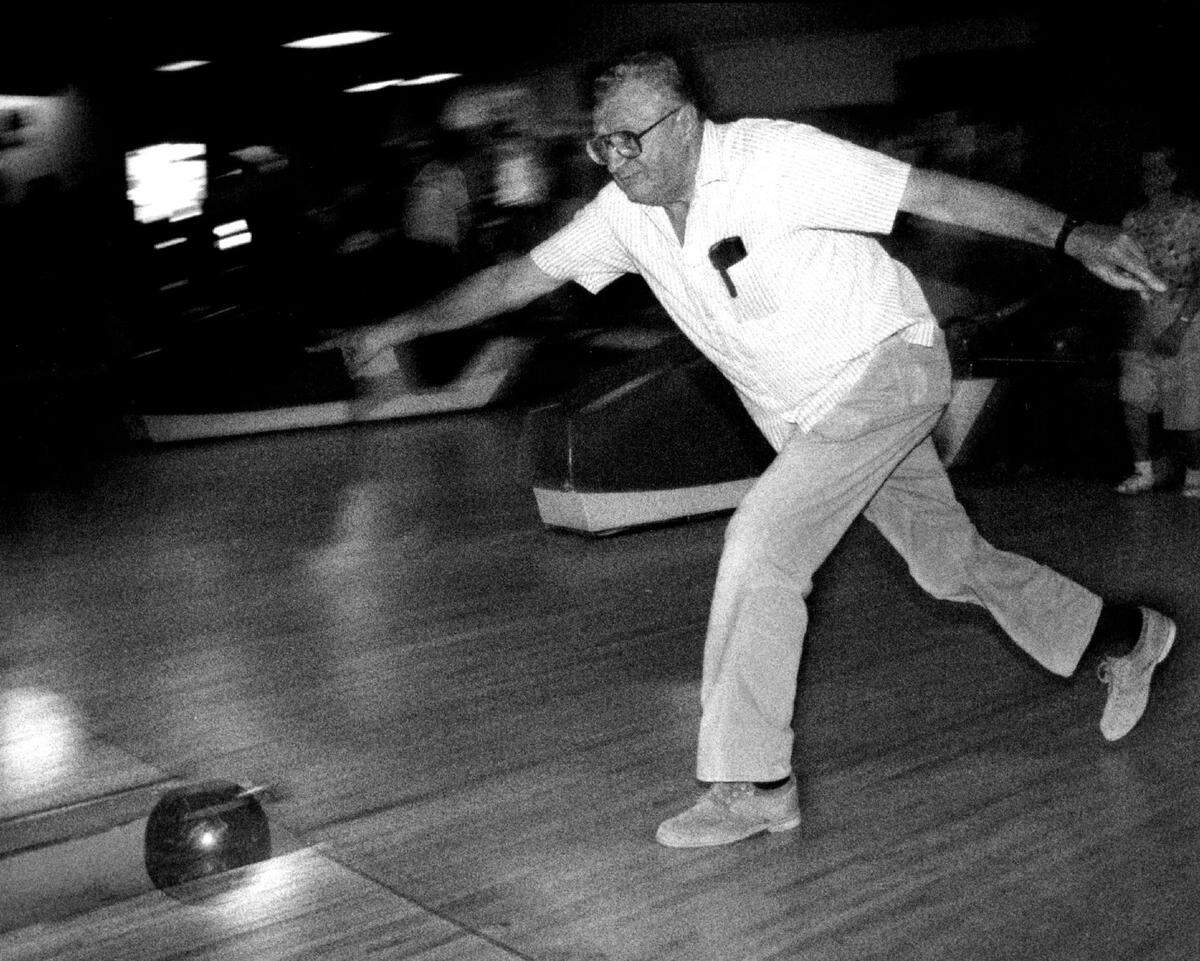 In 1992, Thomas Guerriero lets the bowling ball go during a game with some friends at the Holiday Lanes in Hallandale Beach. The bowling alley, near a casino, was recently demolished.