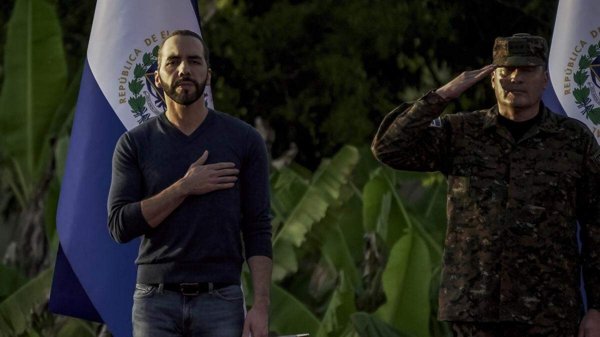 Salvadoran President Nayib Bukele addresses more than 14,000 troops in San Juan Opico, where he announced that police and soldiers will enter cities to search for gang members during eight months of the ongoing state of emergency that put more than 62,000 behind bars in 2022.