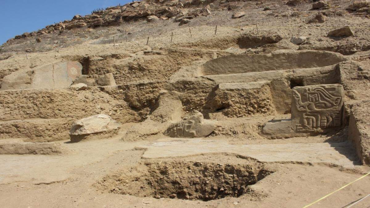 A carving of a human with a bird’s head and a painting were found at the ancient temple.