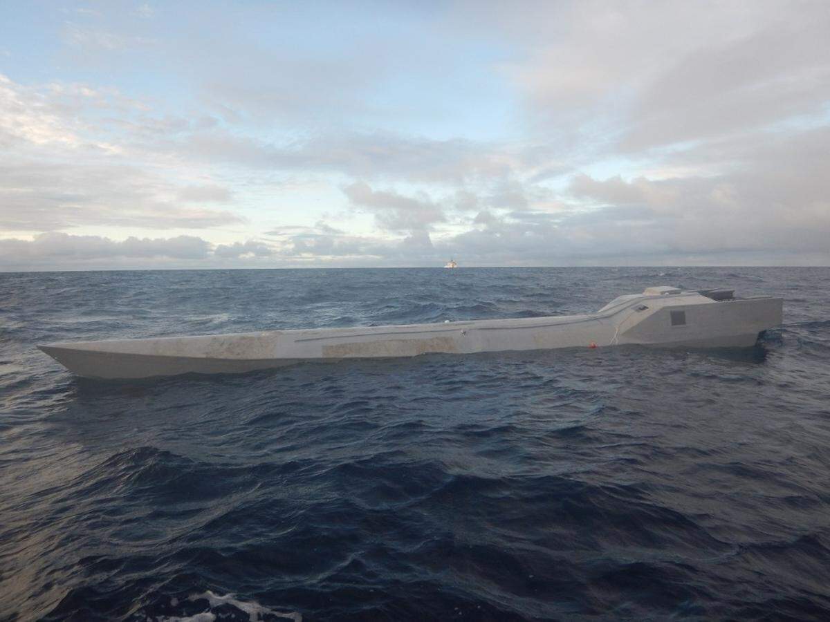 A low-profile, suspected cocaine smuggling vessel drifts in international waters of the Eastern Pacific Ocean after being intercepted by the crew of the U.S. Coast Guard Cutter Thetis on Nov. 21, 2019.