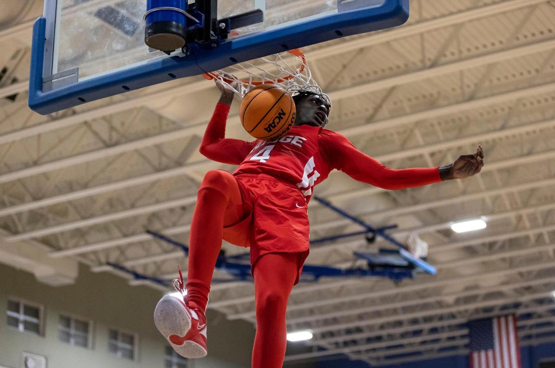 Southridge Spartans Koree Cotton (4) reacts after dunking against the South Dade Buccaneers during the first half of a GMAC quarter-finals basketball game at South Dade High School on Tuesday, Jan. 24, 2023, in Homestead, Fla.