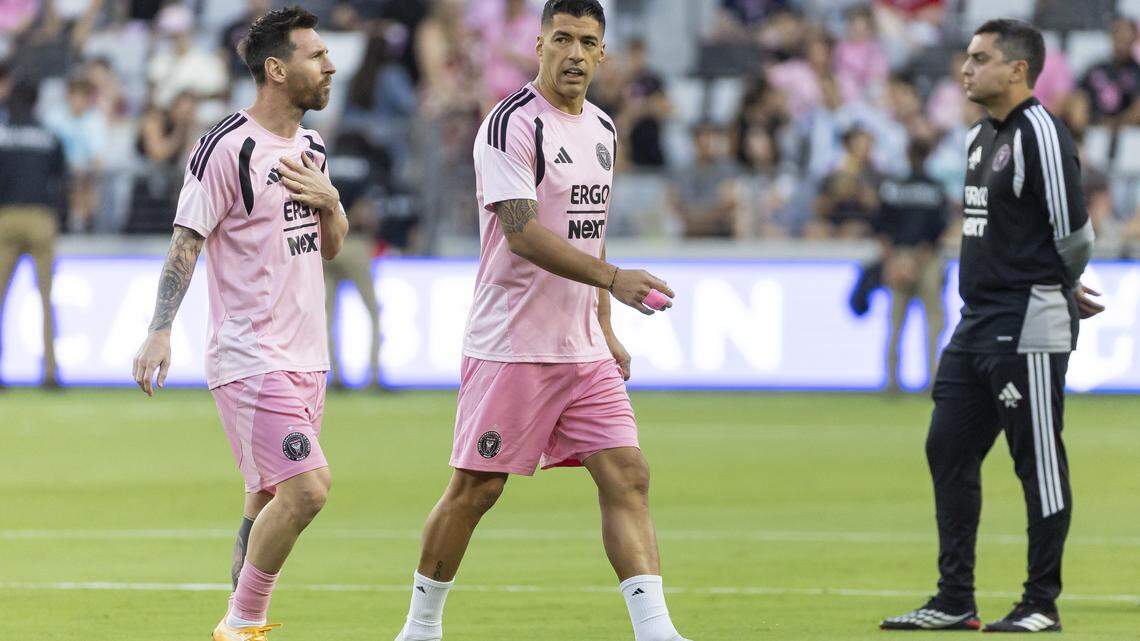 Inter Miami midfielder Lionel Messi (10) and forward Luis Suárez (9) warmup before their MLS match against the New England Revolution in Nu Stadium at Miami Freedom Park on Saturday, April 25, 2026, in Miami, Fla.