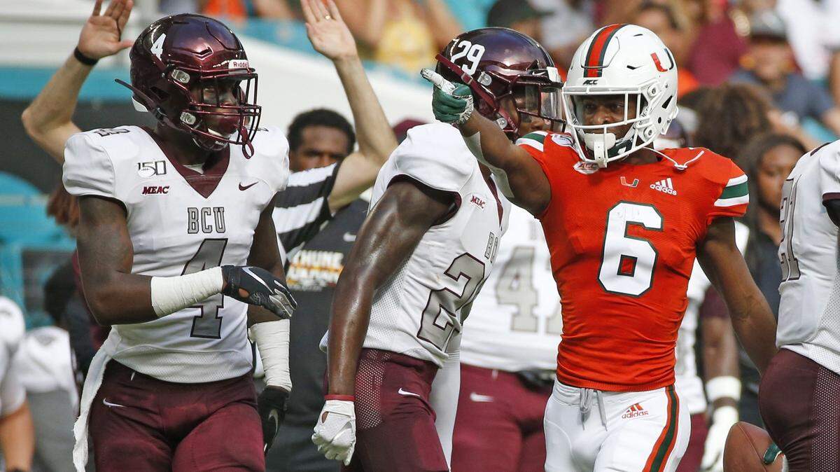 Miami Hurricanes wide receiver Mark Pope (6) signals a first down in the second quarter as the University of Miami Hurricanes host Bethune-Cookman Wildcats at Hard Rock Stadium in Miami Gardens on Saturday, September 14, 2019.