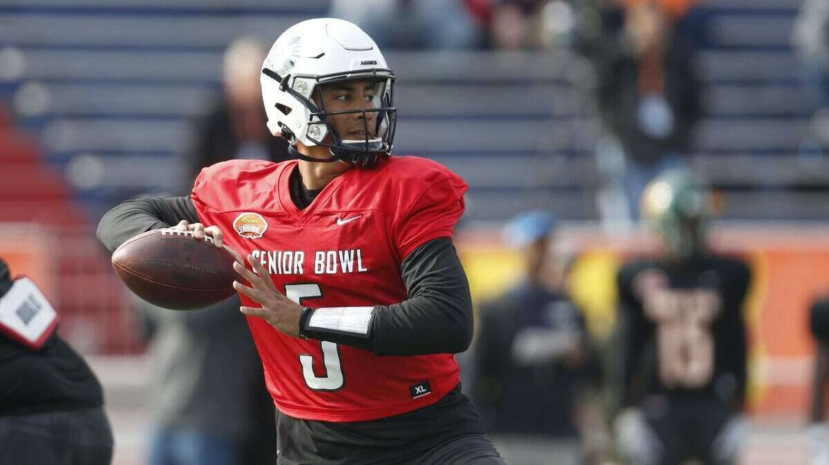 Utah State’s Jordan Love throws a pass as the North squad runs drills during practice for the Senior Bowl Wednesday, Jan. 22, 2020, in Mobile, Ala. (AP Photo/Butch Dill)