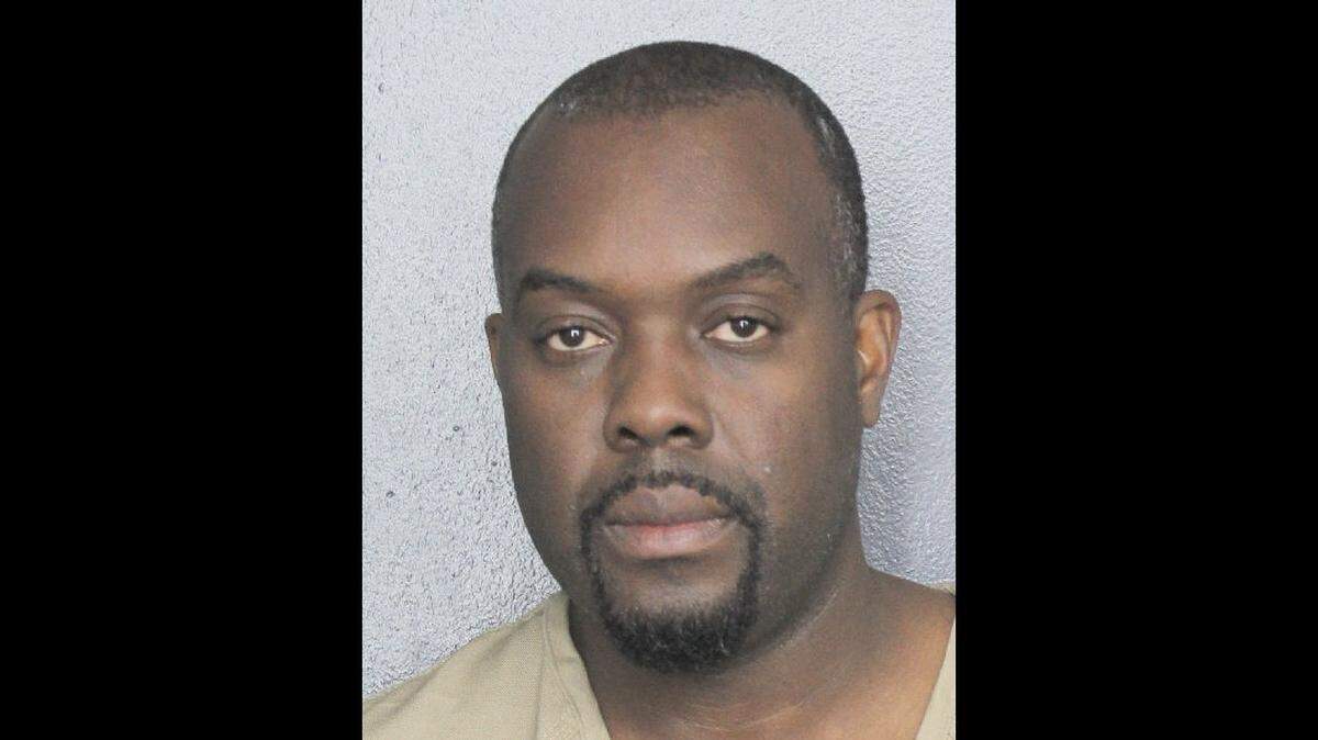 Miami-Dade police officer Leopold Louis’ mugshot after his arrest Sunday, Nov. 20.