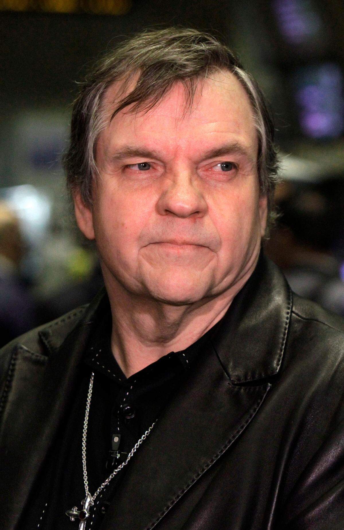 FILE - This June 21, 2010, file photo shows rock singer Meat Loaf on the floor of the New York Stock Exchange before ringing the opening bell. Meat Loaf, whose “Bat Out Of Hell” album is one of the all time bestsellers, has died, family said on Facebook, Friday, Jan. 21, 2022.