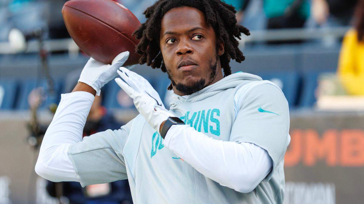Miami Dolphins quarterback Teddy Bridgewater (5) sets up to pass during pregame warmups before the start of an NFL football game against the Chicago Bears at Soldier Field on Sunday, November 6, 2022 in Chicago, Illinois.