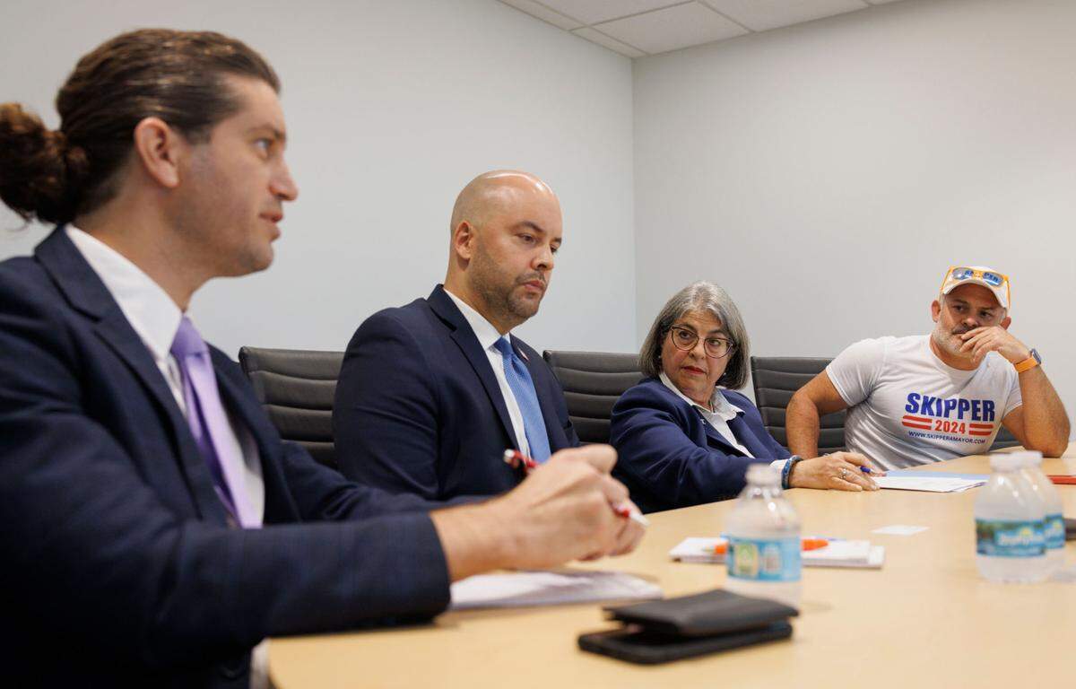 From left to right, Shlomo Danzinger speaks while the other candidates for Miami-Dade County mayor: Manny Cid, current Miami Lakes mayor; Mayor Daniella Levine Cava; and Miguel “El Skipper” Quintero listen on Wednesday, July 17, 2024, at the Miami Herald office in Miami.