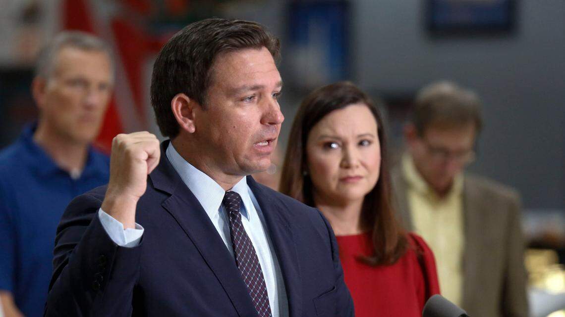 Before addressing the Chamber of Commerce and the state’s business leaders, Florida Governor Ron DeSantis and Attorney General Ashley Moody, right, had a press conference in Lakeland on Thursday, Oct. 28, to announce a lawsuit against the federal government over its requirement that employees of federal contractors be vaccinated.