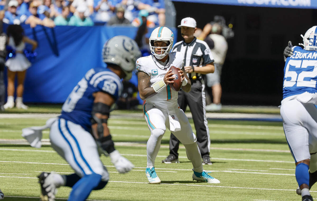 Miami Dolphins quarterback Tua Tagovailoa (1) prepares to throw during the first half of an NFL game against the Indianapolis Colts during the first half of an NFL game against Indianapolis Colts at Lucas Oil Stadium on Sunday, September 7, 2025, in Indianapolis, Indiana.