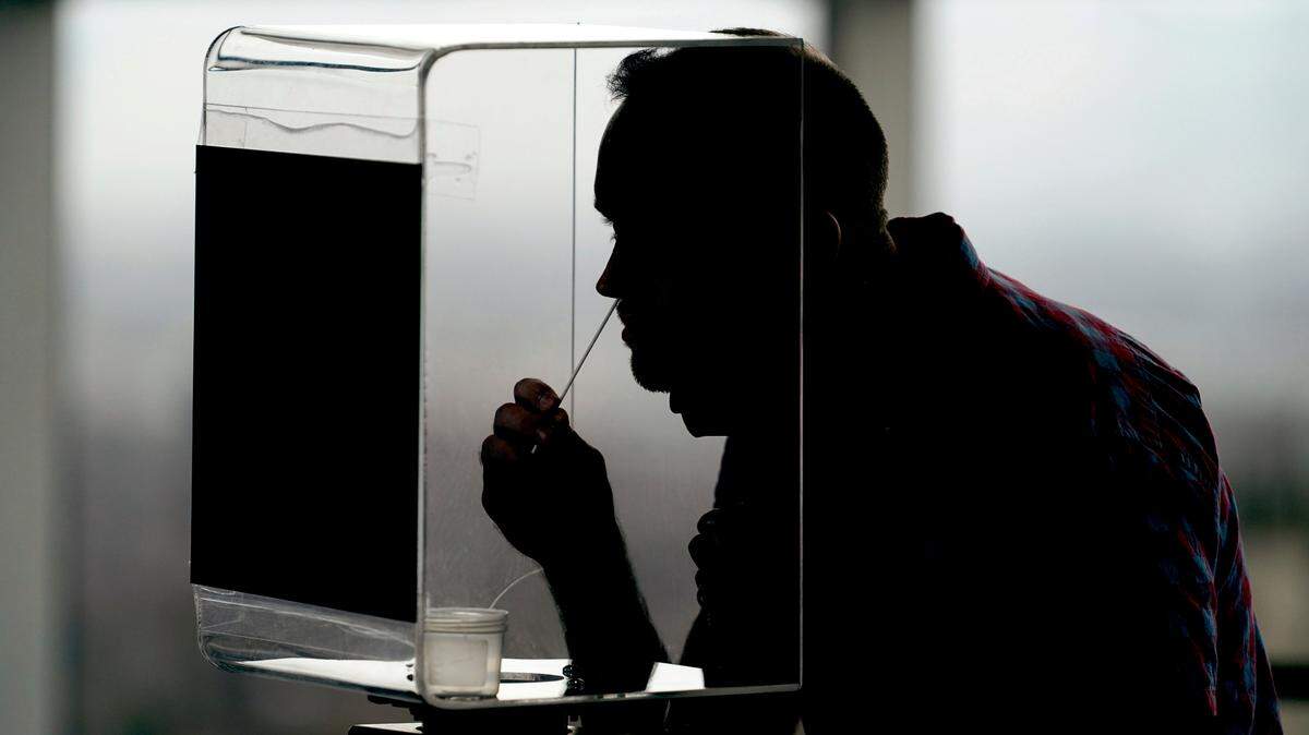 University of Utah student Andrew Goaslind takes a rapid COVID-19 test Wednesday, Nov. 18, 2020, in Salt Lake City.