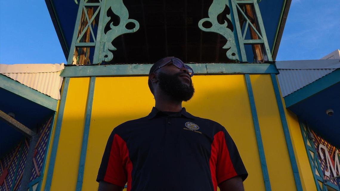 Qunyatta Warren, the LHCC’s former director, is photographed in front of the Caribbean Marketplace.