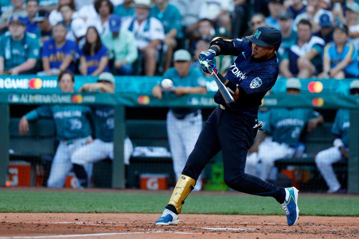 National League second baseman&nbsp;Luis Arraez&nbsp;of the Miami Marlins (3) hits an RBI single against the American League during the fourth inning of the 2023 MLB All Star Game at T-Mobile Park.