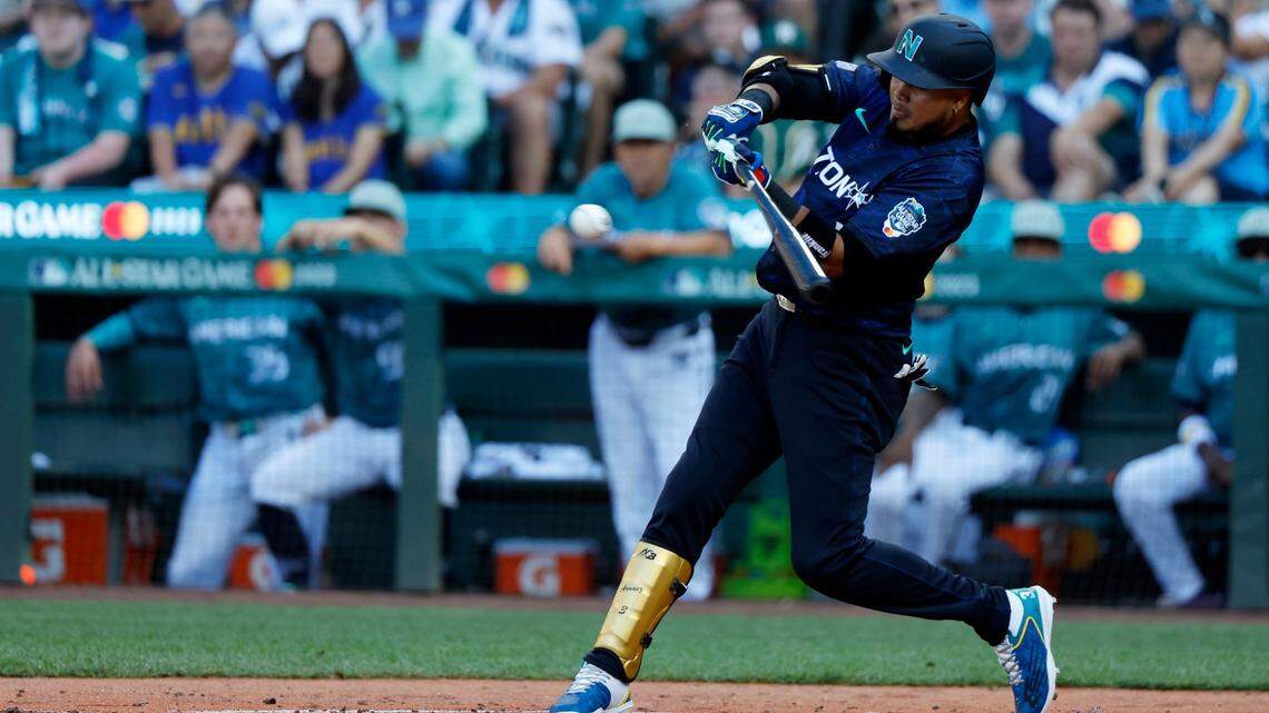 National League second baseman Luis Arraez of the Miami Marlins (3) hits an RBI single against the American League during the fourth inning of the 2023 MLB All Star Game at T-Mobile Park.