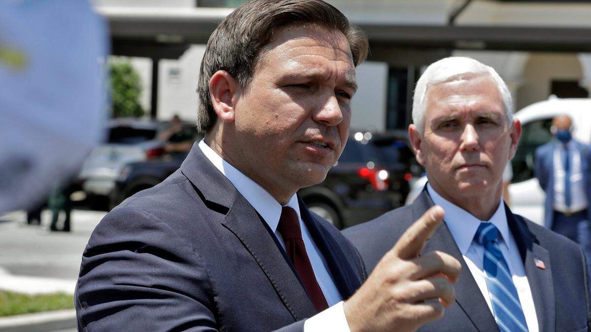 As Vice President Pence watched, Florida Gov. Ron DeSantis launched a tirade against former health department data manager Rebekah Jones.