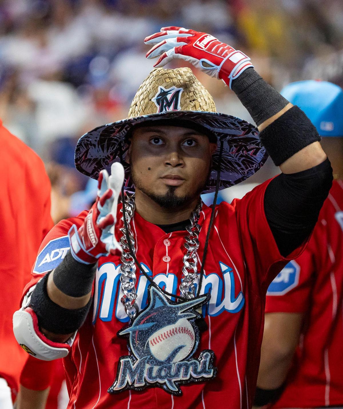 Miami Marlins second baseman Luis Arraez (3) celebrates after hitting a home run against the New York Yankees in the first inning of an MLB game at loanDepot park on Saturday, Aug. 12, 2023, in Miami, Fla.