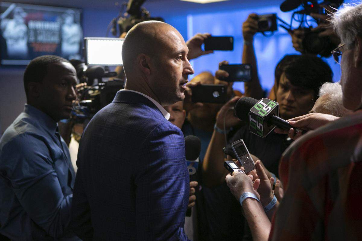 Marlins CEO Derek Jeter talks to the media.