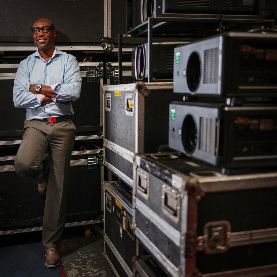 Joe Louissaint, 54, stands among the many equipment cases at his warehouse in Miami Gardens, Florida, on Wednesday, Aug. 28, 2024. He operates an AV production business called Show Technology that produces events ranging from corporate meetings to festivals. Louissaint was the audiovisual director for multiple hotels throughout Miami before launching his company in 2000.