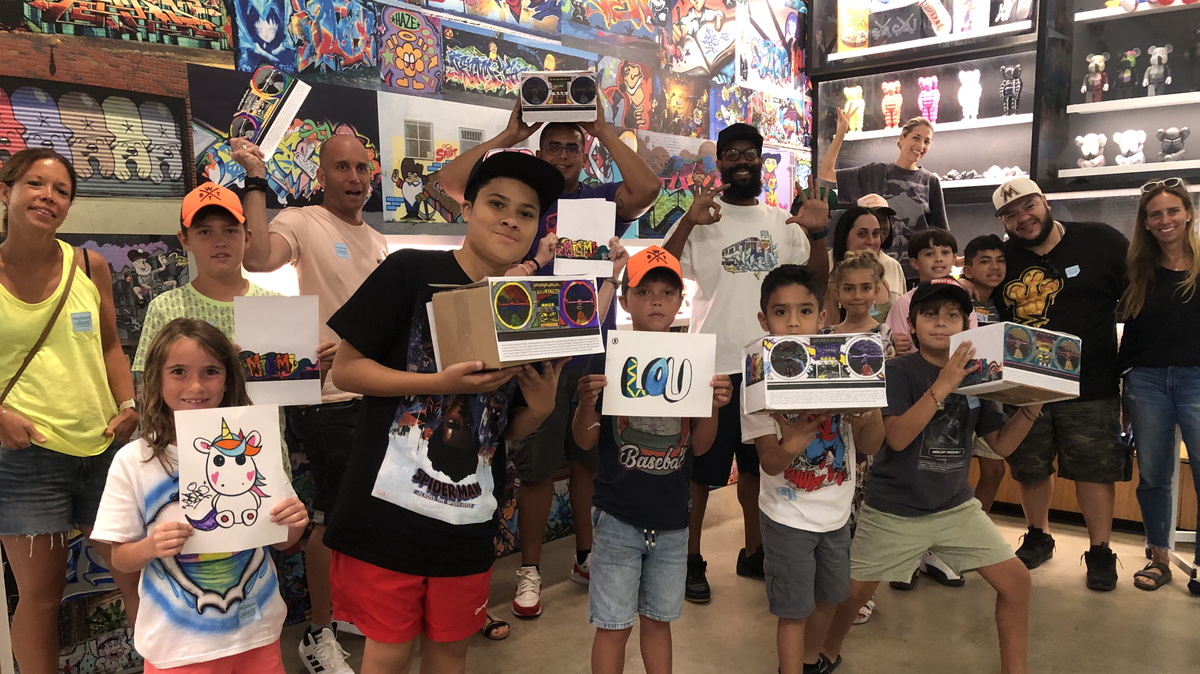 Attendees showcase their graffiti art at the first annual FAM JAM in August 2023. Held in honor of Hip-Hop Appreciation Week, the event will showcase the five elements of hip-hop culture – djaying, MCing, breakdancing, graffiti and knowledge of self –  in an interactive forum for all ages. 