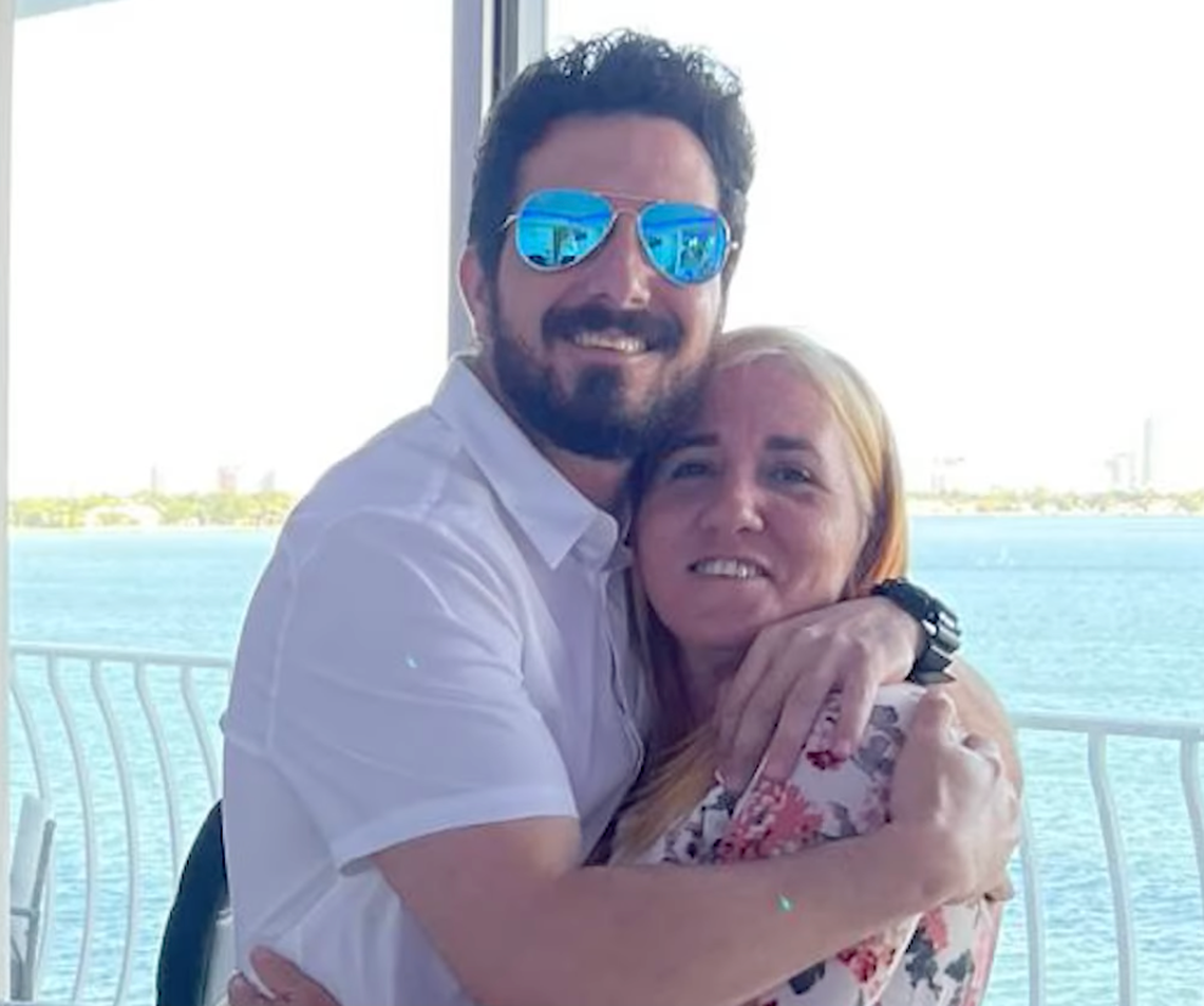 Michael Borrego Fernandez hugs his mother Yaneisy Fernandez.