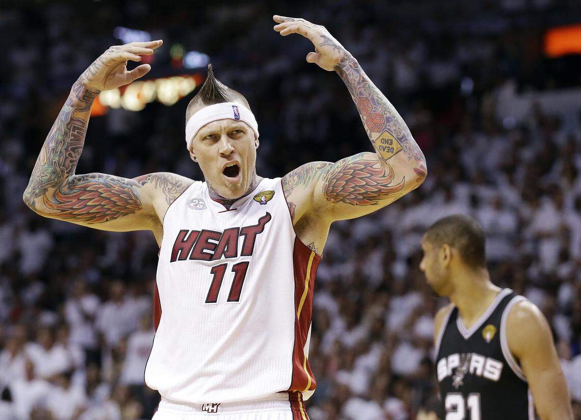 Miami Heat power forward Chris Andersen (11) gets the crowd to cheer against the San Antonio Spurs during the first half in Game 7 of the NBA Finals in 2013 in Miami.