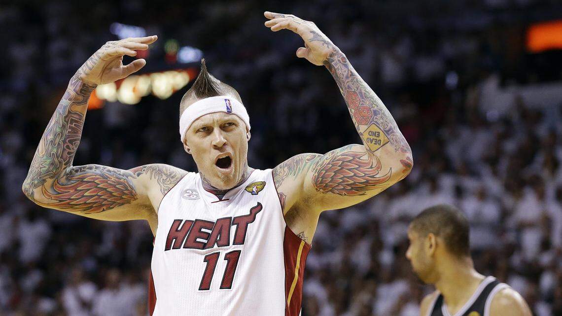Miami Heat power forward Chris Andersen (11) gets the crowd to cheer against the San Antonio Spurs during the first half in Game 7 of the NBA Finals in 2013 in Miami.