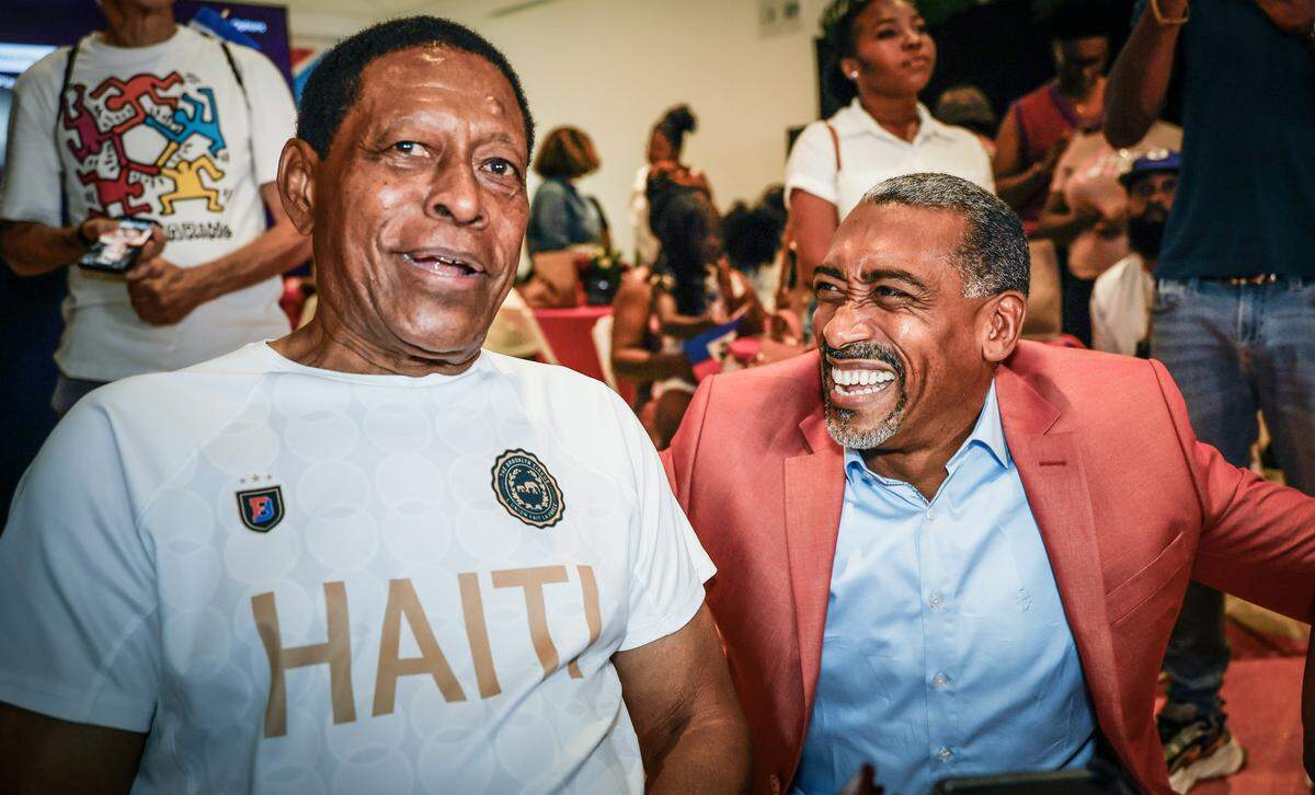ARTBEAT MIAMI honors Haiti's 1974 World Cup team players including Pierre Bayonne, at left. Joining him for the celebration is Patick Tardieu, a former captain of the Haitian national team and the first Haitian player to sign with Major Leaque Soccer, at the Little Haiti Cultural Center in Miami, Florida, on Sunday, May 24, 2026.