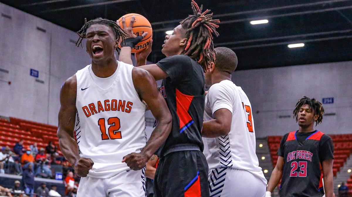 Stranahan High School’s forward Hykeem Williams (12) reacts after scoring against Pine Forest in Class 5A boys basketball semifinal at the RP Funding Center in Lakeland on Thursday, March 3, 2022.
