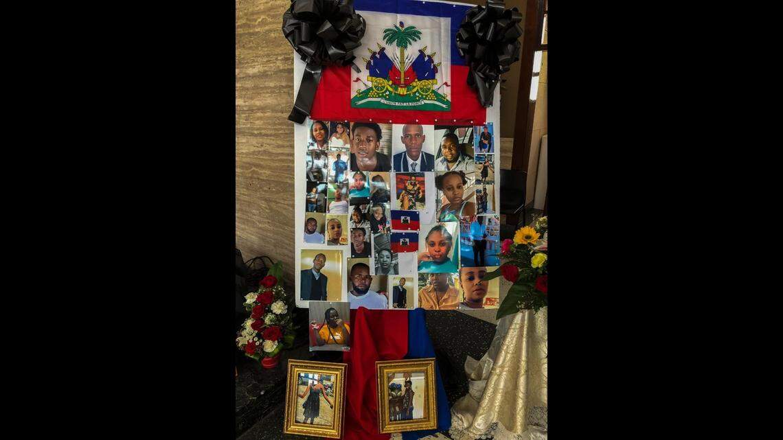 Ribbons and flags decorate the photos of the 11 Haitian women and others who went missing last month when the overloaded boat they were in capsized, at a church in San Juan, Puerto Rico, Wednesday, June 15, 2022.