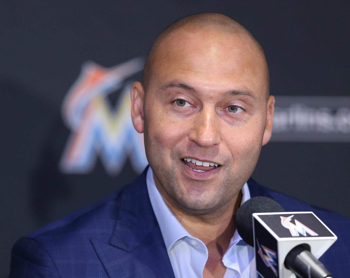 Derek Jeter at his first press conference as a Miami Marlins owner on Tuesday, October 3, 2017. Lawyers representing the team recently claimed the franchise is a citizen of the British Virgin Islands for the purposes of deciding where a suit filed by Miami-Dade County should be heard. The Marlins want it heard in federal court, and transferred to an arbitrator.